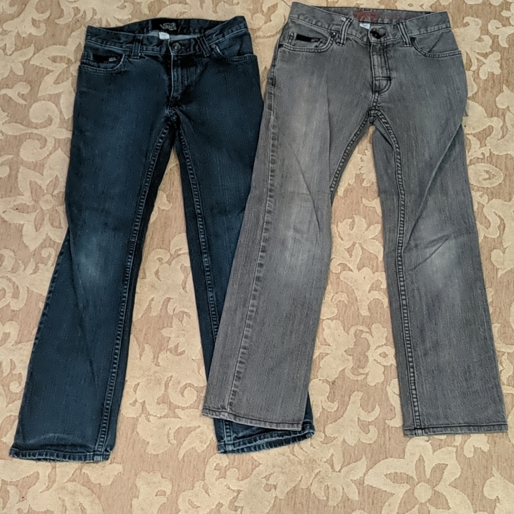2 pairs of jeans. One gray and one blue, size 12